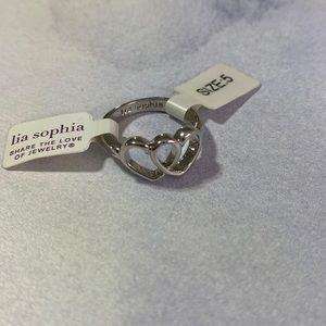 Lia Sophia two heart ring. Sizes 5